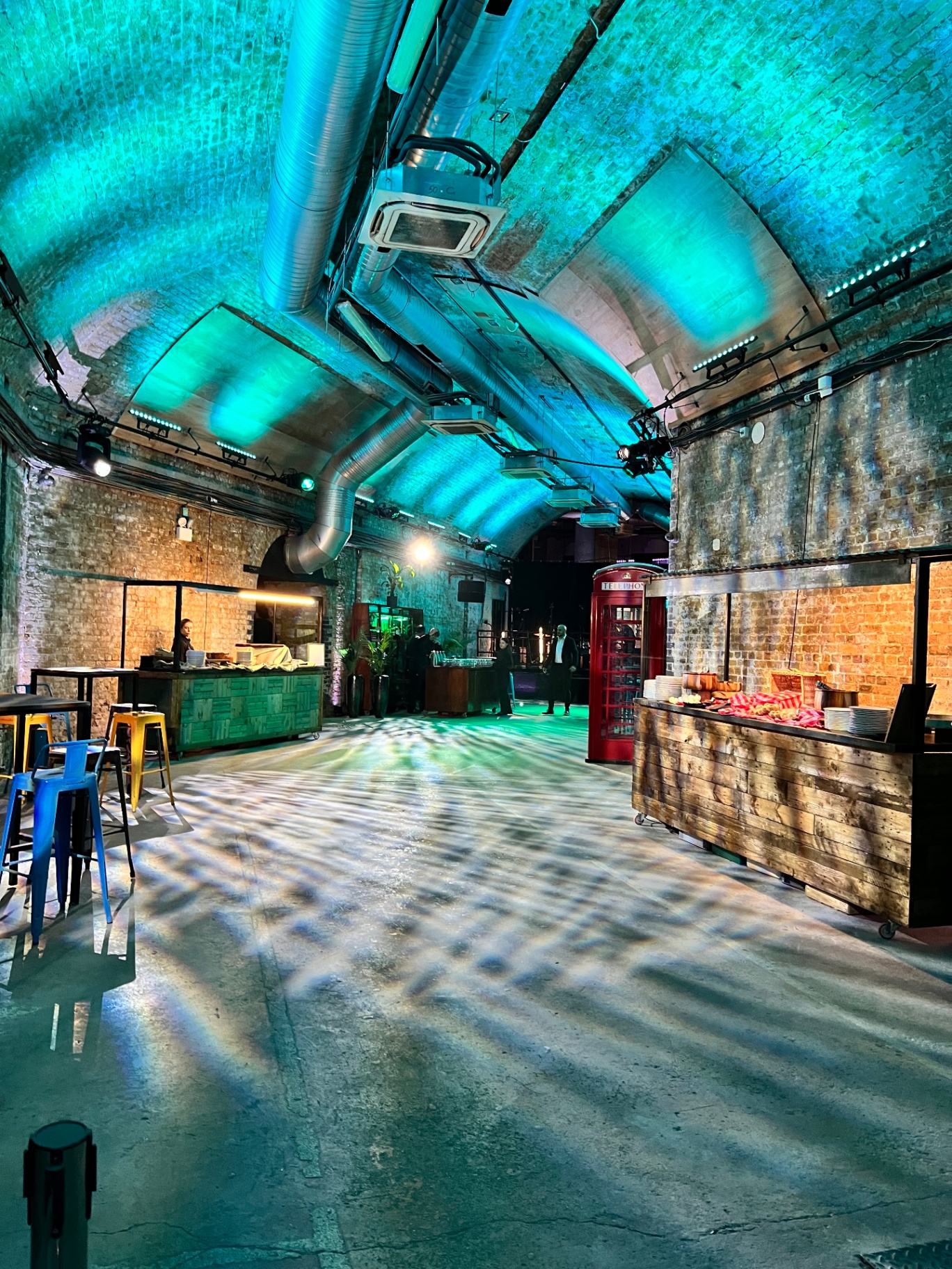 Industrial arches venue with bar and lighting