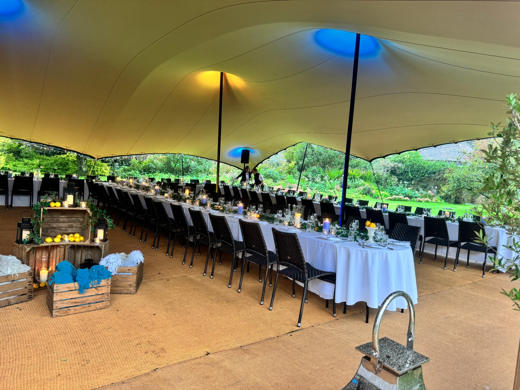 Stretch tent dinner set in a garden